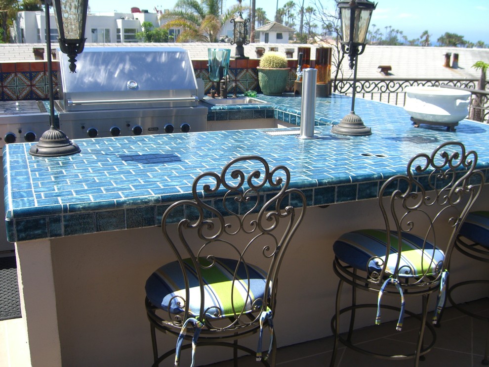 Design ideas for a large mediterranean roof terrace in San Diego with an outdoor kitchen and no cover.