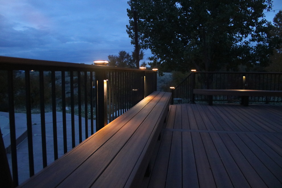 Inspiration for a mid-sized transitional backyard deck remodel in Denver with no cover