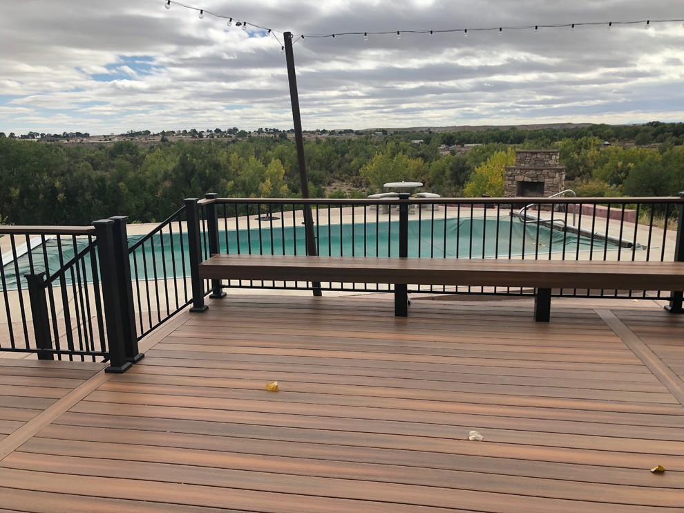 Mid-sized elegant backyard deck photo in Denver with no cover