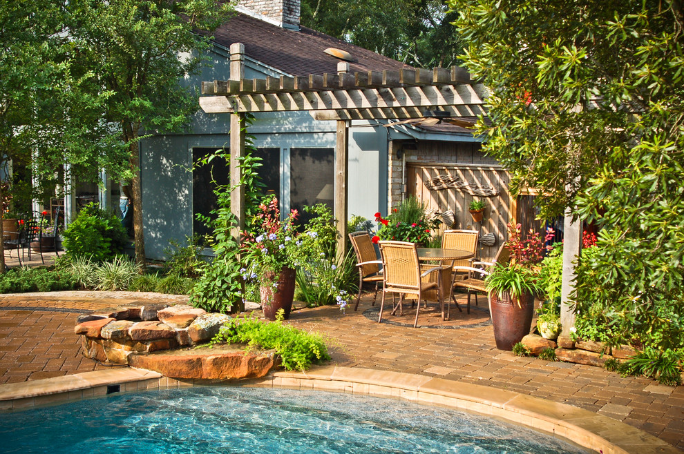 Mid-sized tuscan backyard deck photo in Houston
