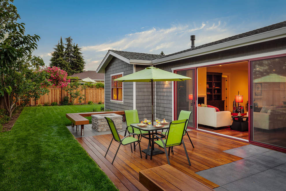 Inspiration for a contemporary backyard deck remodel in San Francisco with a fire pit and no cover