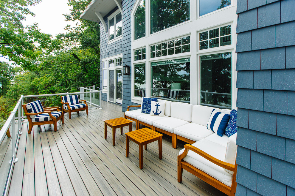 Inspiration for a large coastal backyard deck remodel in Other