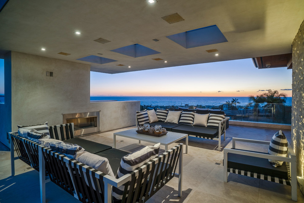 Inspiration for a large contemporary roof terrace in San Diego with an outdoor kitchen and a roof extension.