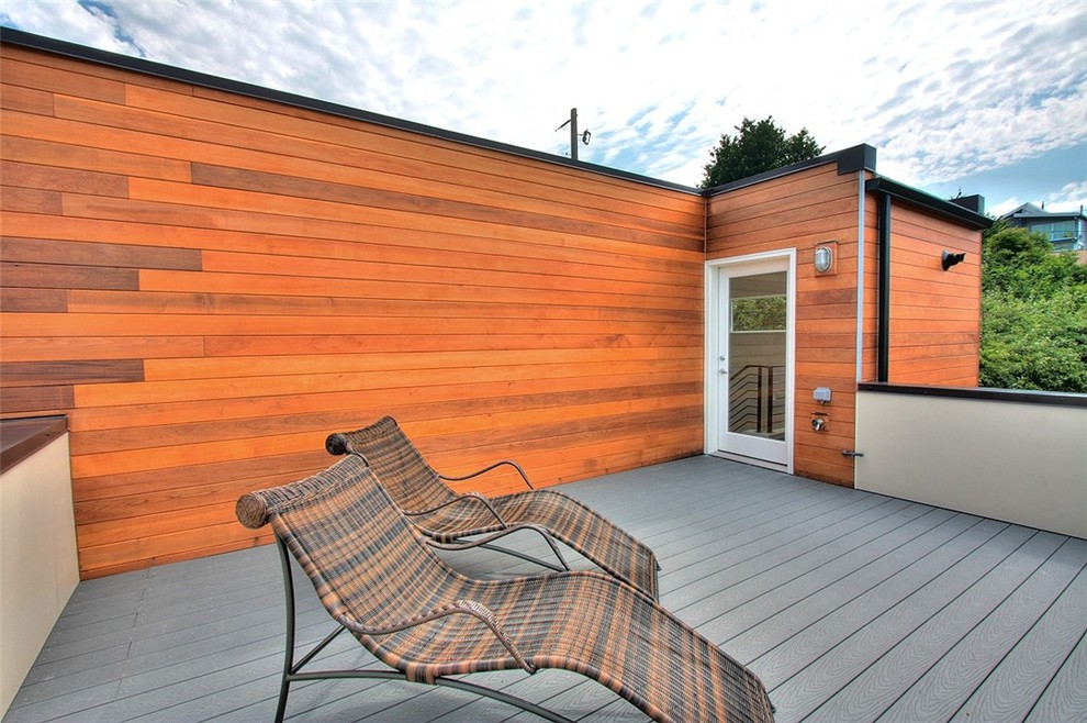 Minimalist deck photo in Seattle with no cover
