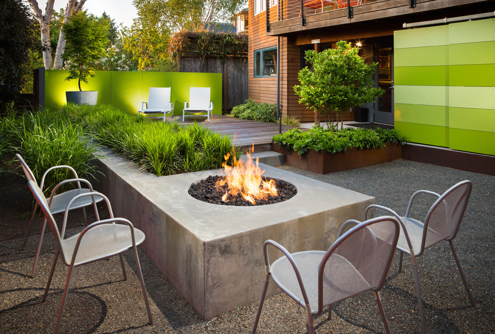 Example of a small trendy backyard patio container garden design in Seattle with no cover