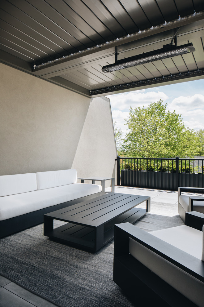Foto de terraza minimalista pequeña en azotea con pérgola