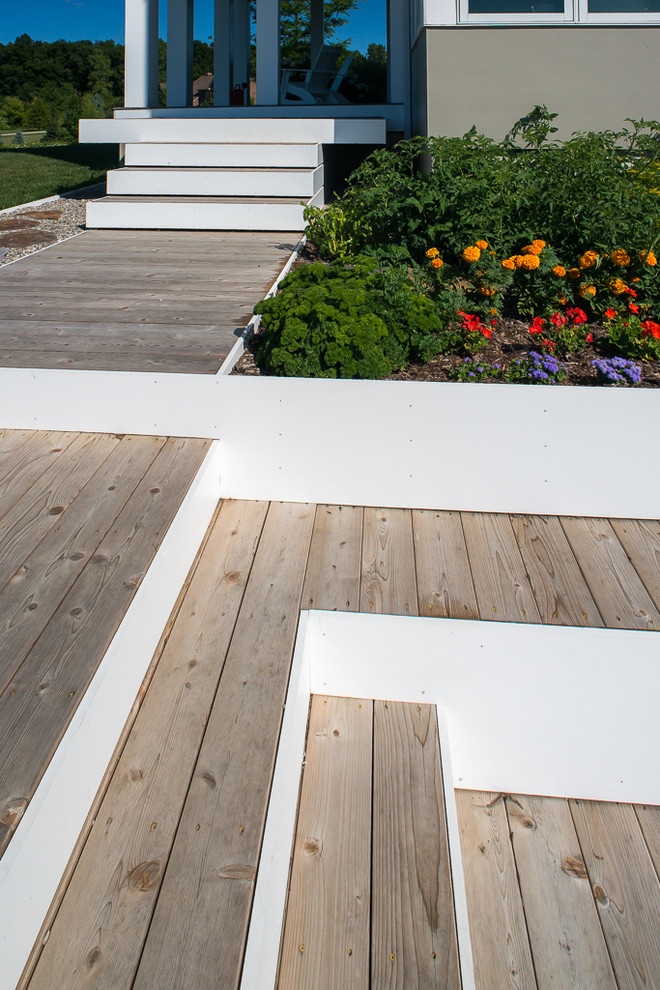 Deck - mid-sized contemporary backyard deck idea in Detroit