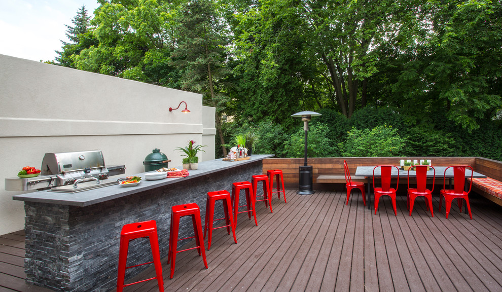 Example of a small trendy backyard deck design in Other with no cover