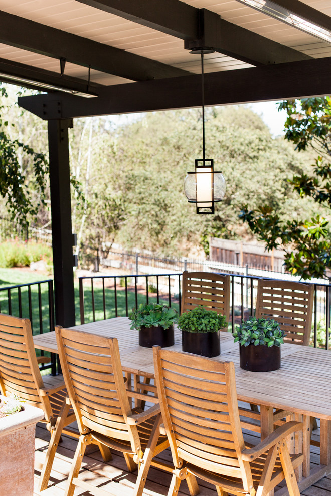 Inspiration for a mid-sized modern backyard deck remodel in San Francisco with a pergola