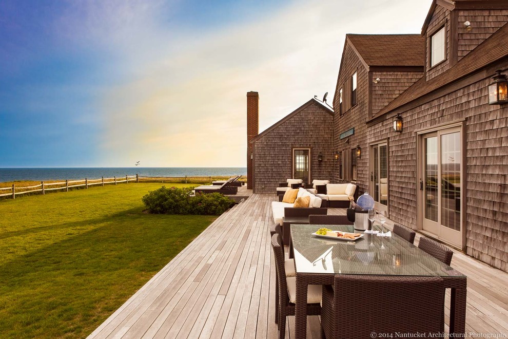 Large beach style backyard deck photo in Boston with no cover