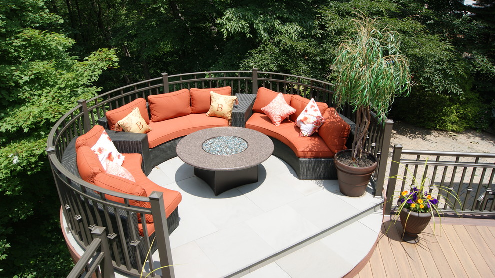 Medium sized contemporary roof terrace in New York with a fire feature and no cover.