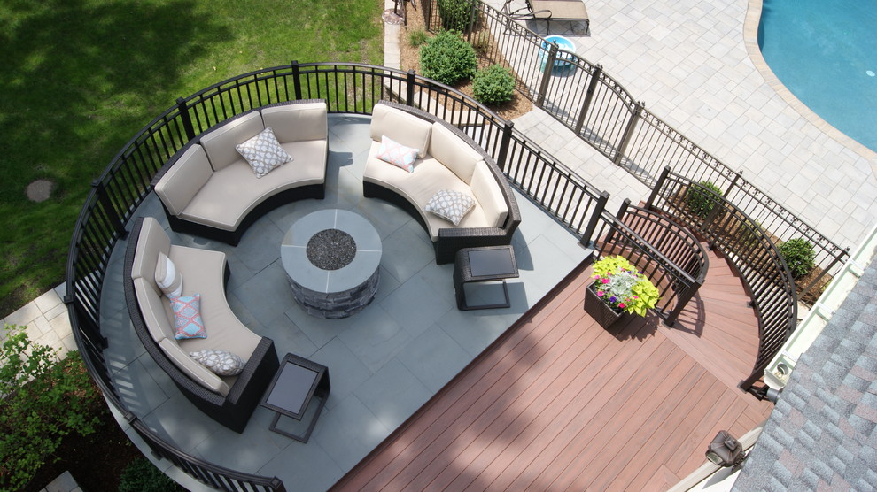Deck - huge craftsman backyard deck idea in New York with a fire pit