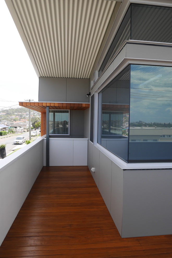 Bild på en funkis terrass, med takförlängning