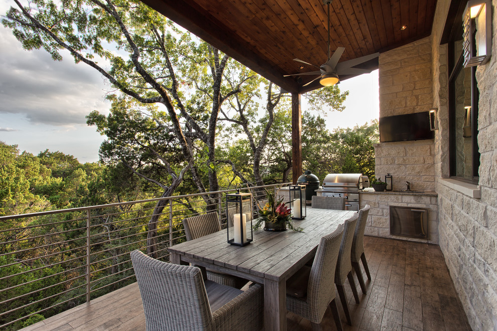 Überdachte Rustikale Terrasse mit Grillplatz in Austin