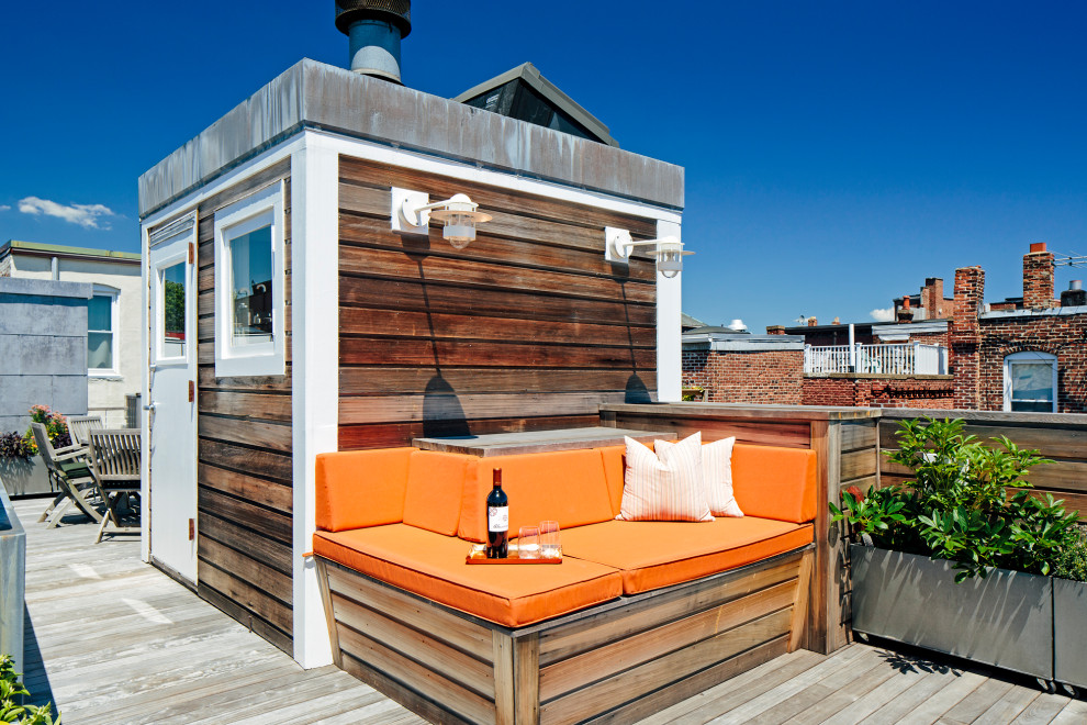 Immagine di una terrazza minimalista di medie dimensioni e sul tetto con nessuna copertura