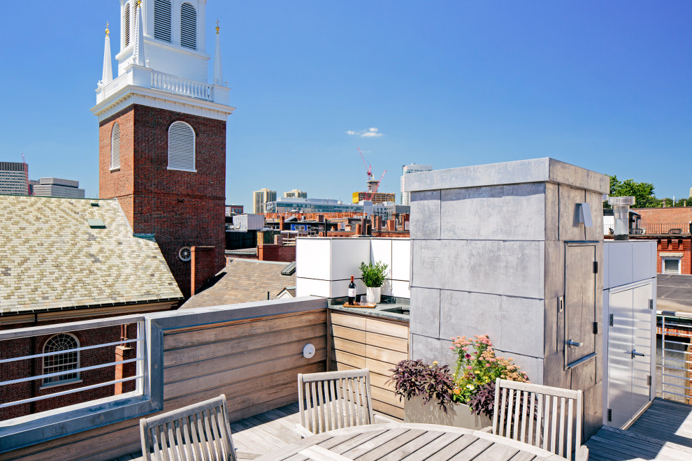 Photo of a medium sized modern roof terrace in Boston with no cover.
