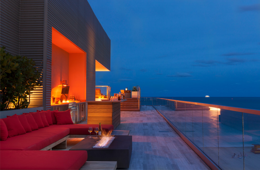 Inspiration pour une terrasse design avec une cuisine d'été.