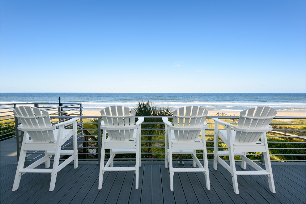 Example of a beach style deck design in Jacksonville