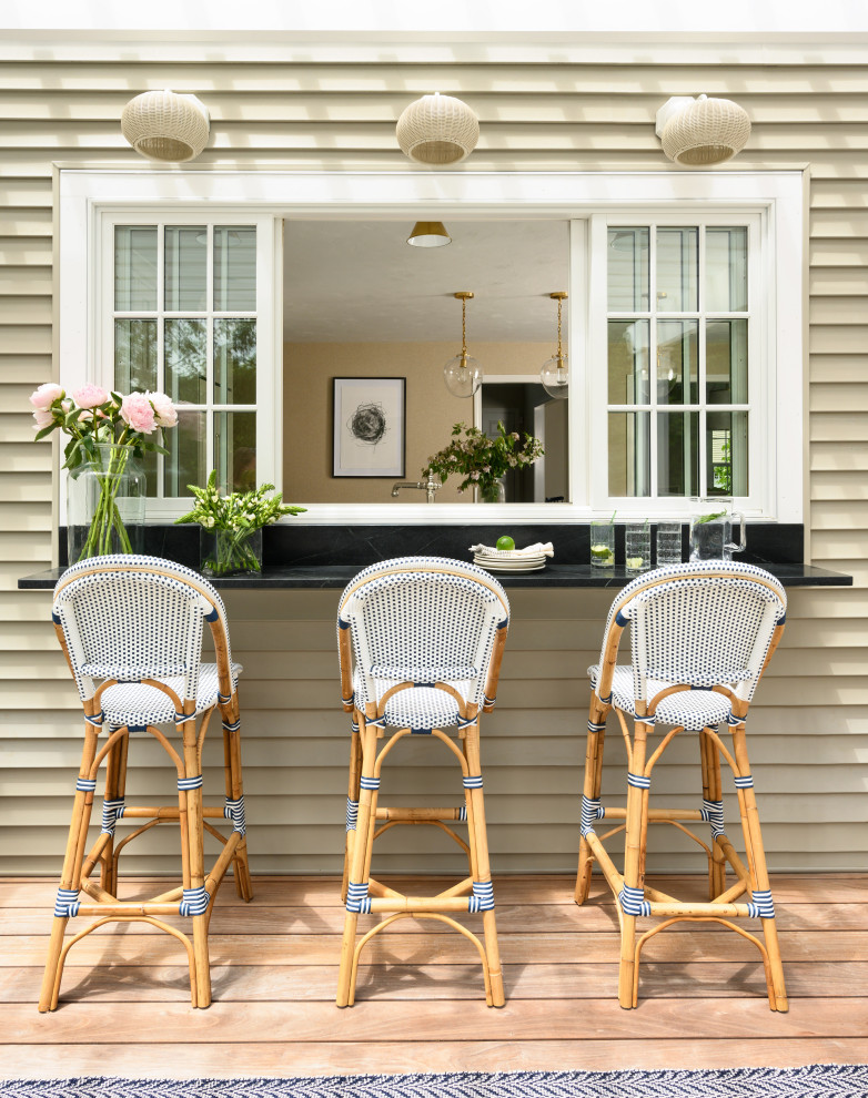 Example of a cottage chic deck design in Boston
