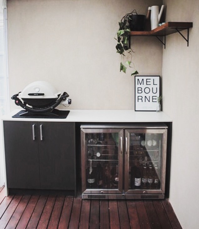 Deck - small contemporary backyard deck idea in Melbourne with a pergola