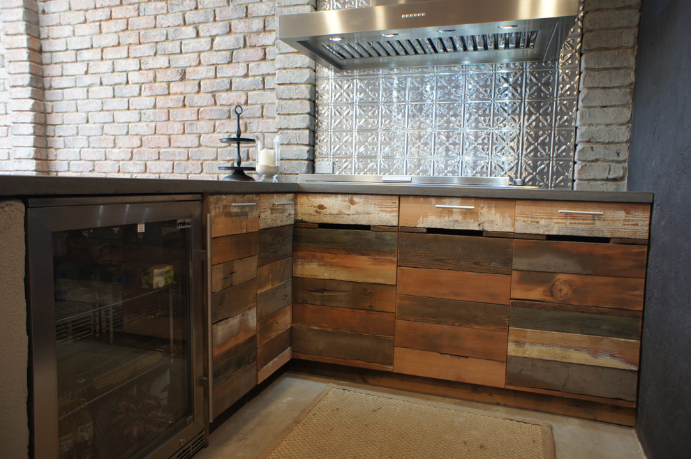 Outdoor Kitchen with Polished Concrete bench tops and Reclaimed Timber