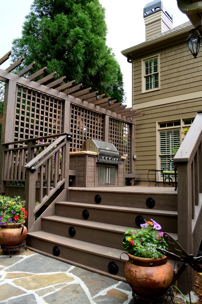 Photo of a medium sized traditional back terrace in Atlanta with no cover and an outdoor kitchen.