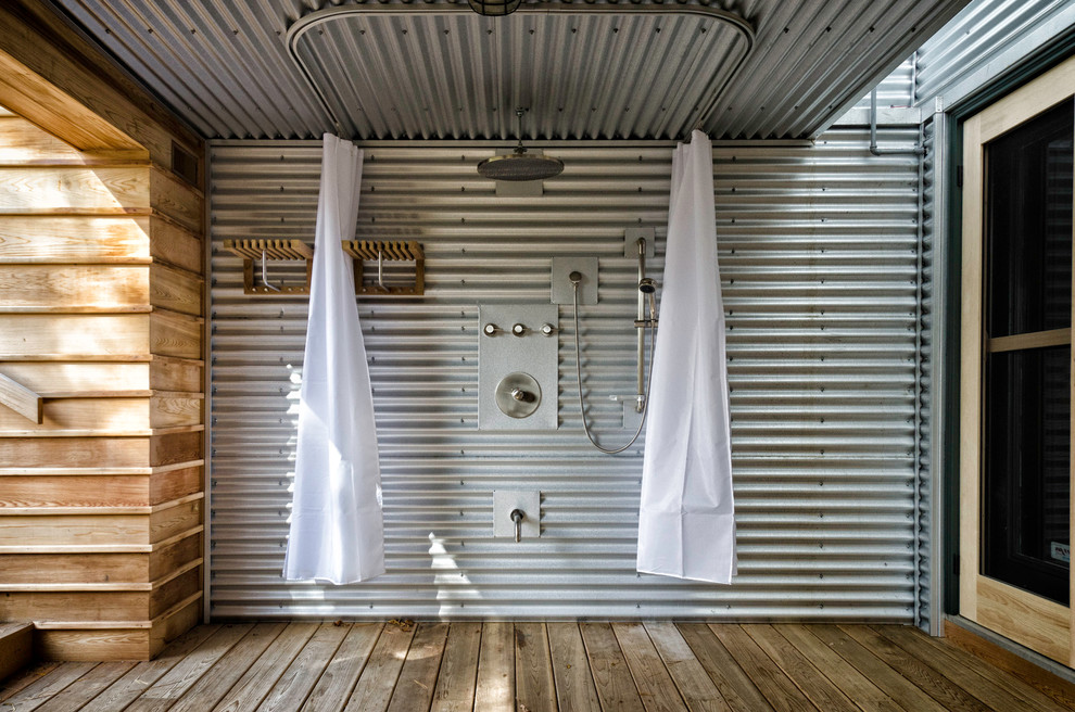 Outdoor shower deck - industrial outdoor shower deck idea in Toronto with a roof extension
