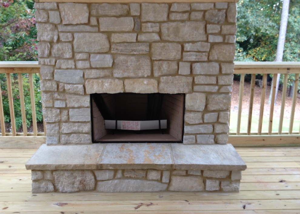 Inspiration for a small timeless backyard deck remodel in Atlanta with a fireplace and no cover
