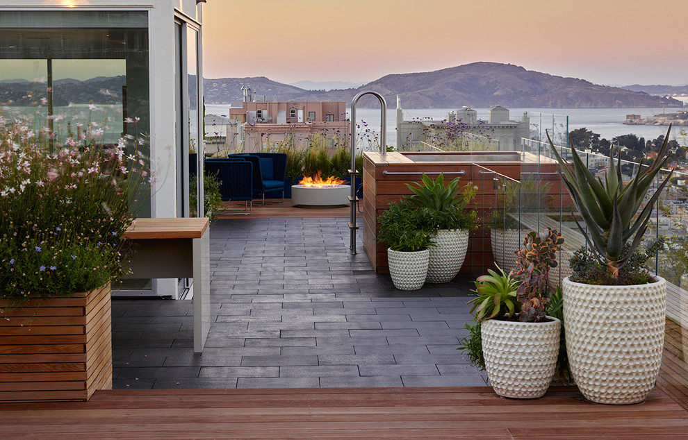 Large contemporary roof terrace in San Francisco with a fire feature and no cover.