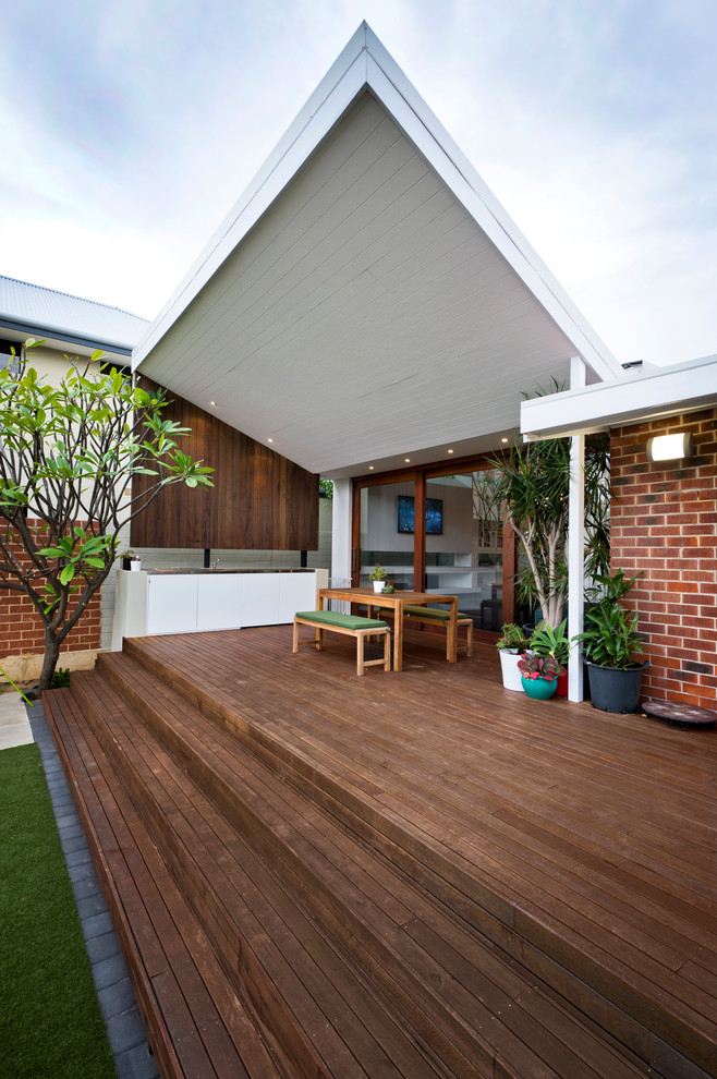Photo of a mid-sized contemporary backyard deck in Perth.