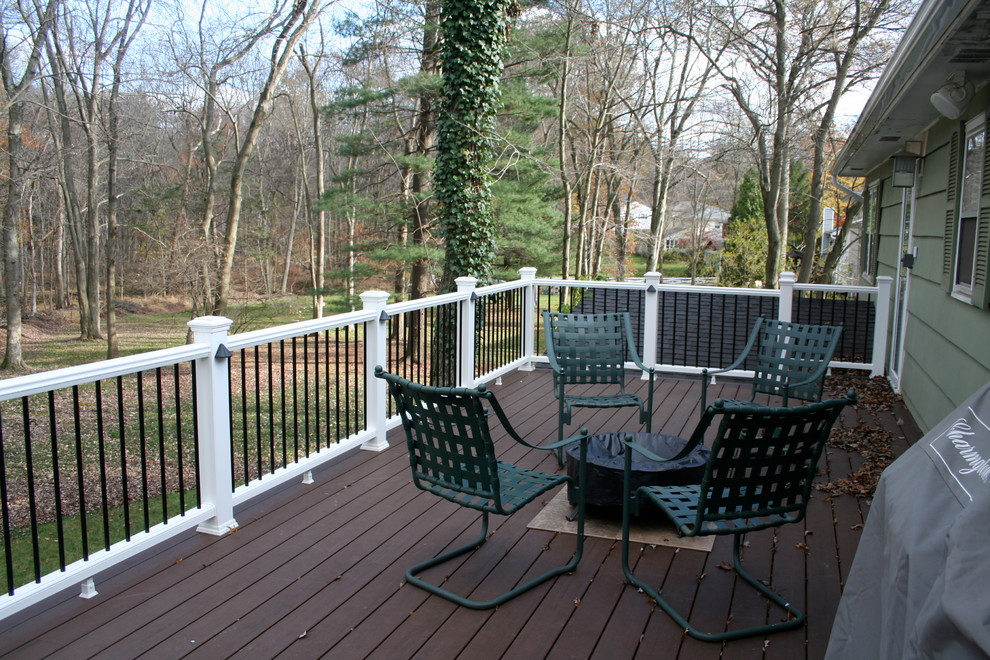 Mid-sized elegant backyard deck photo in New York with no cover