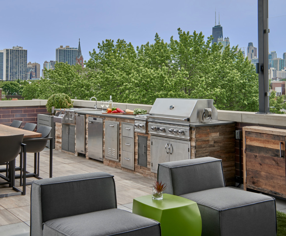 Example of a huge trendy rooftop outdoor kitchen deck design in Chicago with no cover