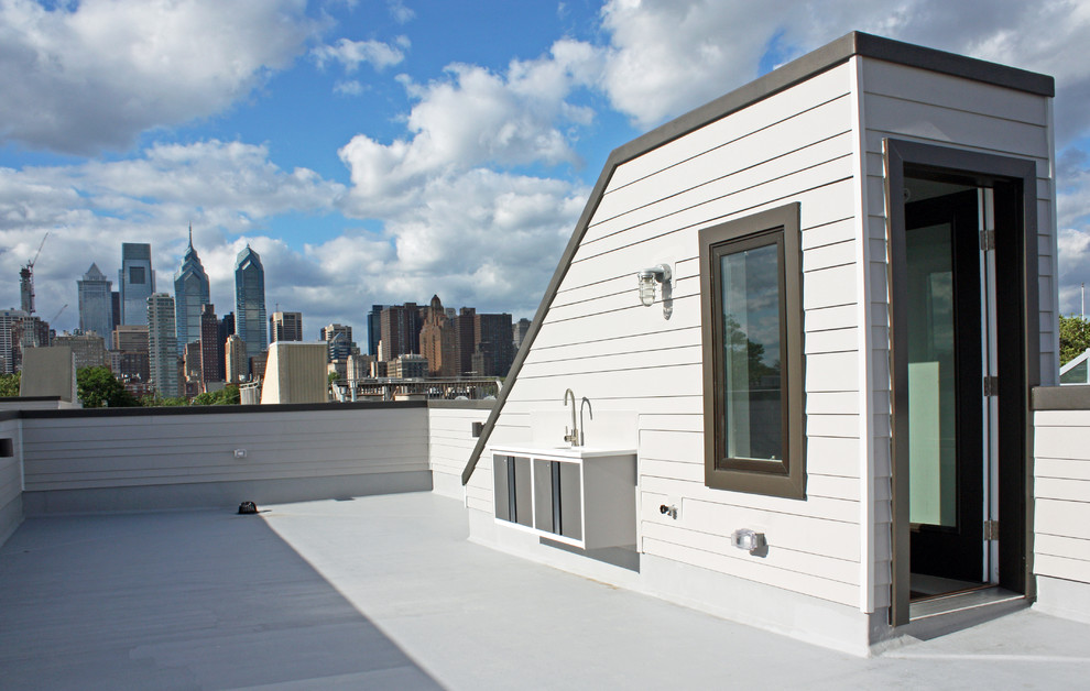Esempio di una terrazza minimalista di medie dimensioni e sul tetto con nessuna copertura