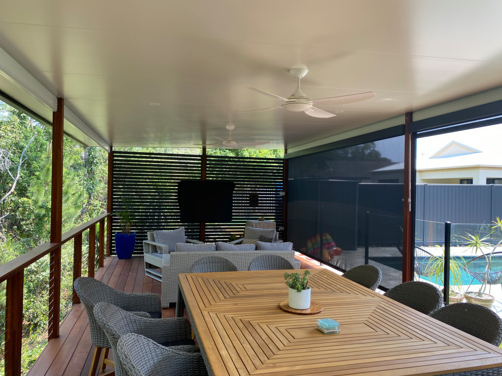 Inspiration for a medium sized contemporary back terrace in Gold Coast - Tweed with a pergola.