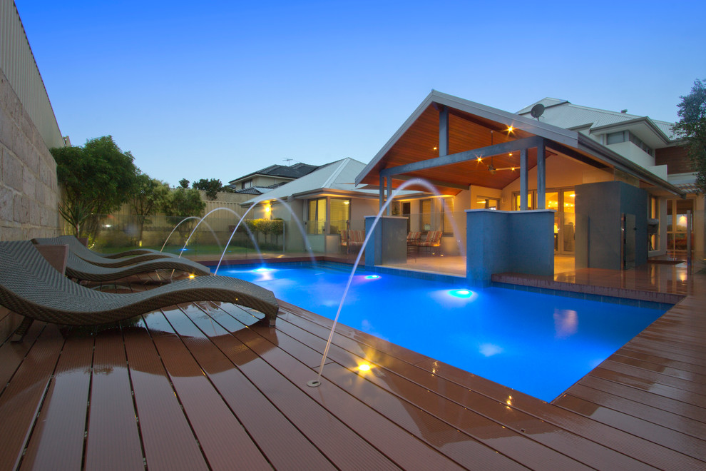 Inspiration for a mid-sized contemporary backyard deck remodel in Perth with no cover