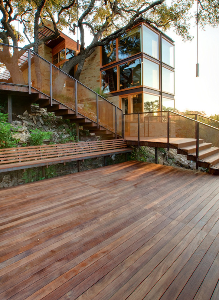Inspiration for an industrial back terrace in Austin.