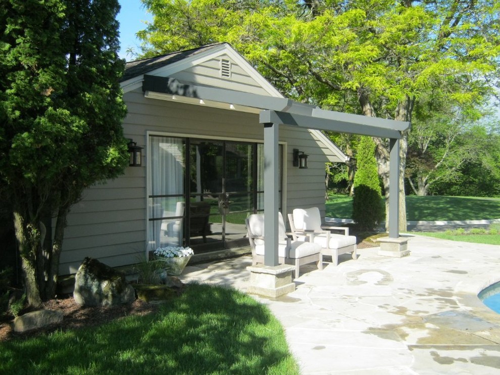 Photo of a small contemporary back terrace in Toronto with a pergola.