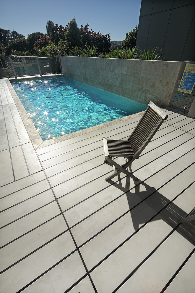Example of a beach style pool design in Sydney