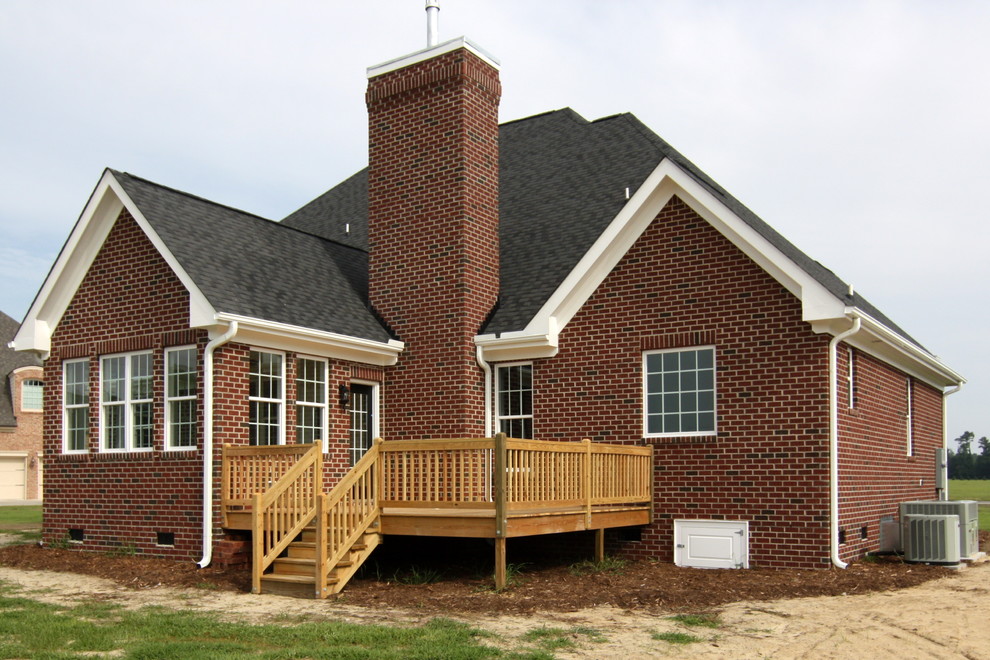 Rear deck on red brick home Traditional Deck Raleigh by Stanton