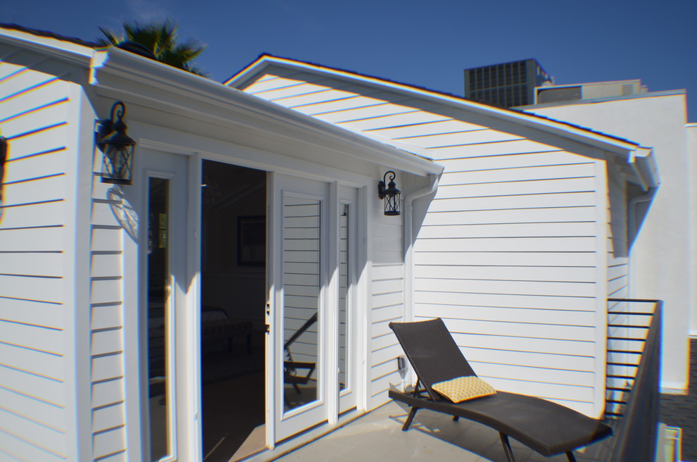 Example of a small classic backyard dock design in Los Angeles with no cover