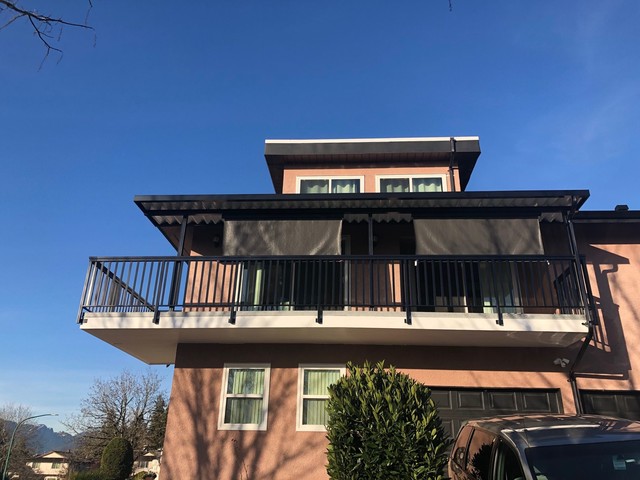 Repair deck, vinyl deck waterproofing, railing and patio cover. COMPLETED - Terrace - Vancouver