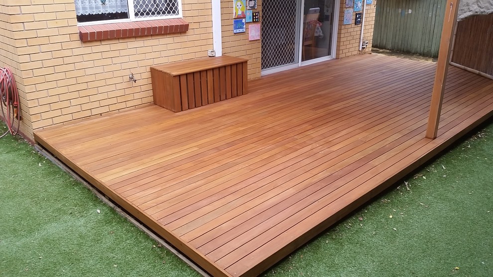 This is an example of a small modern back terrace in Sydney.