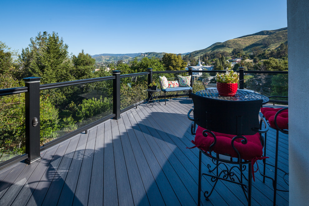 Example of a large trendy backyard deck design in San Luis Obispo with no cover