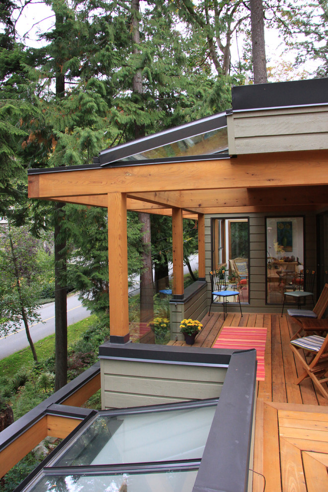 Ejemplo de terraza contemporánea de tamaño medio en anexo de casas
