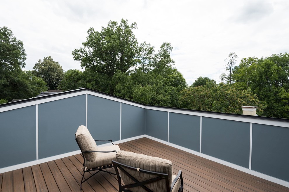 Example of a mid-sized arts and crafts rooftop deck design in DC Metro with no cover