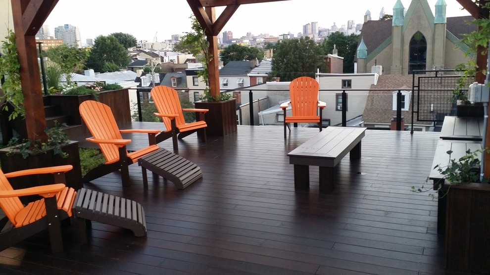 This is an example of a modern roof terrace in Philadelphia with a potted garden.