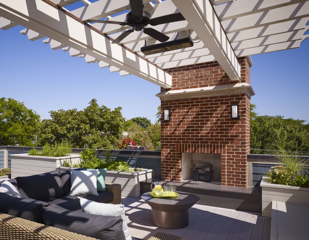 Deck - large transitional rooftop deck idea in Chicago with a pergola