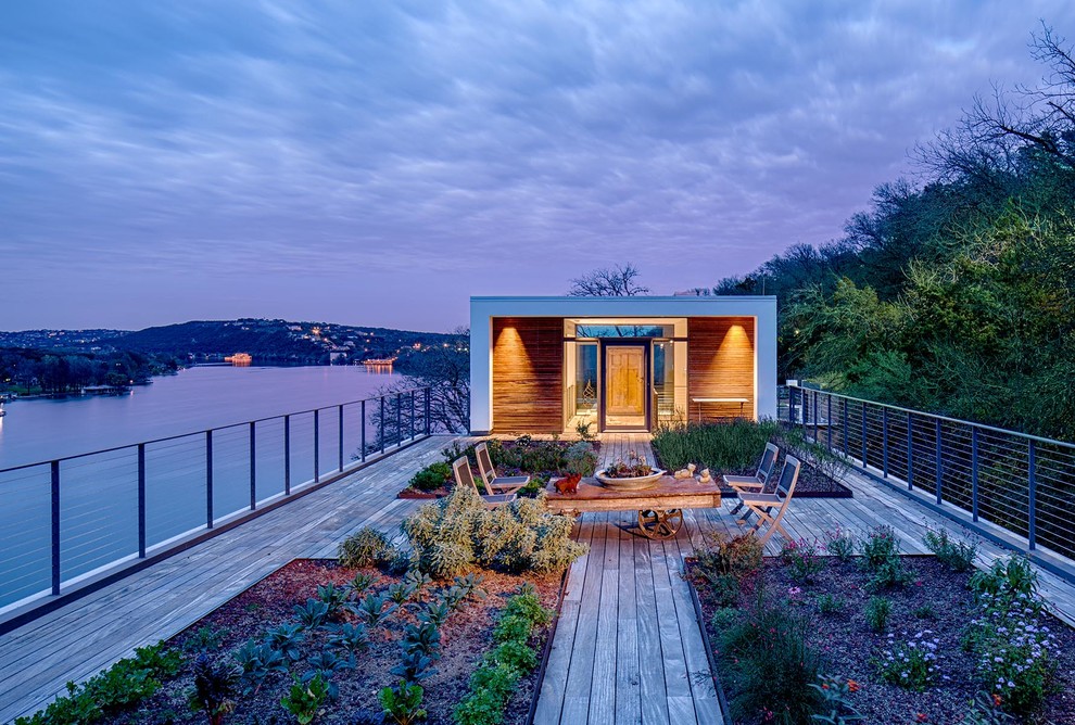 Diseño de terraza minimalista grande sin cubierta en azotea con jardín vertical