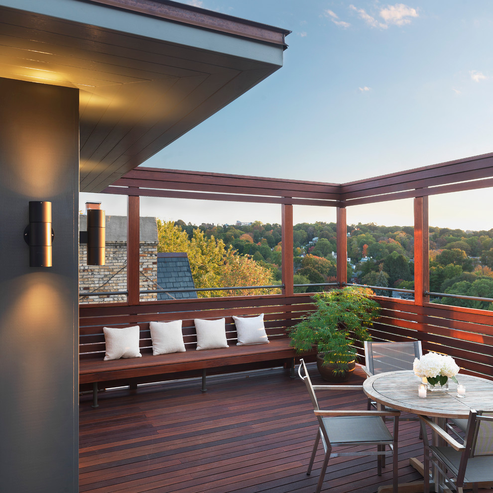 Inspiration för mellanstora moderna terrasser, med takförlängning