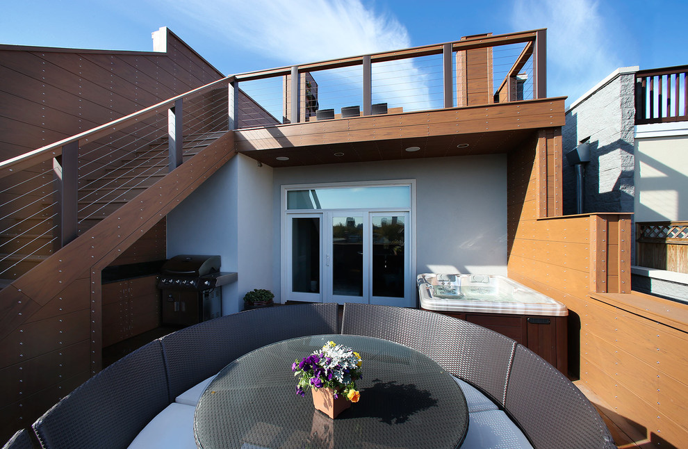 Imagen de terraza contemporánea grande sin cubierta en azotea con cocina exterior